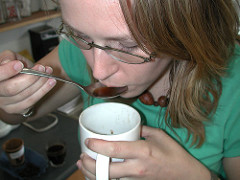 Arieanna slurping coffee
